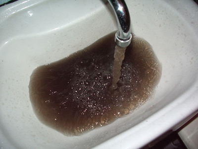 Загрязненная вода